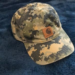 Odessa Carhart hat. Camo print. Velcro adjustable. One size fits all.